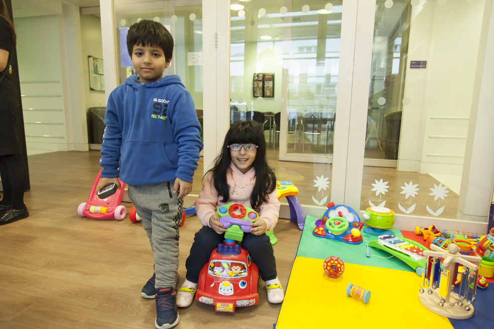 Siblings enjoying Butterfly Ward playroom! 