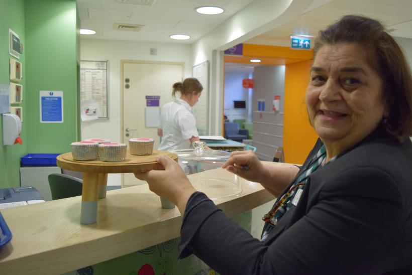 Arabic Interpreter with cupcakes on Caterpillar Outpatients 