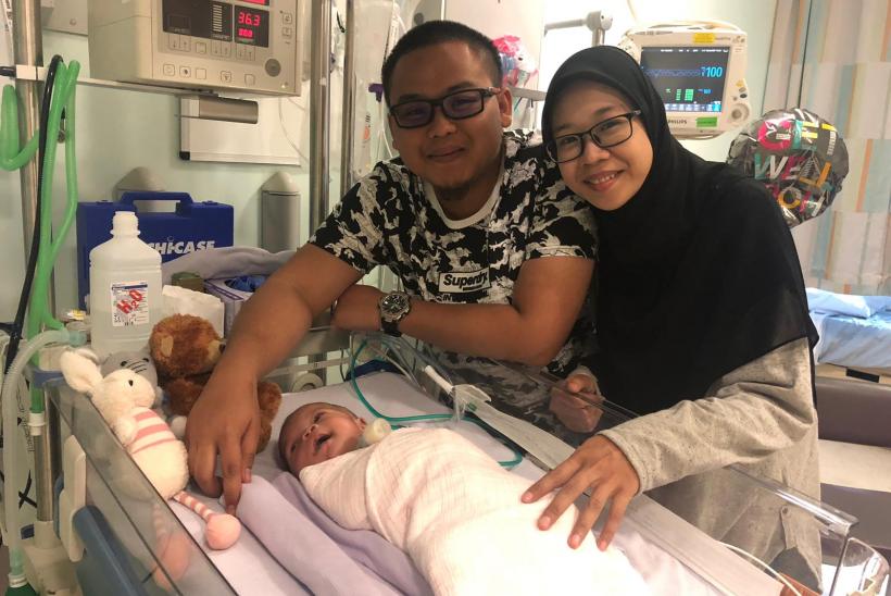 Ainul at GOSH with parents 