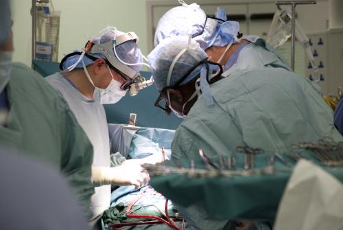 Surgeons performing surgery at GOSH 