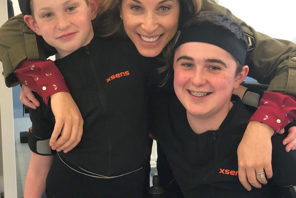 Gavriel (right), his mum (centre) and brother (left) whose movement was also measured in order to make movement comparisons.